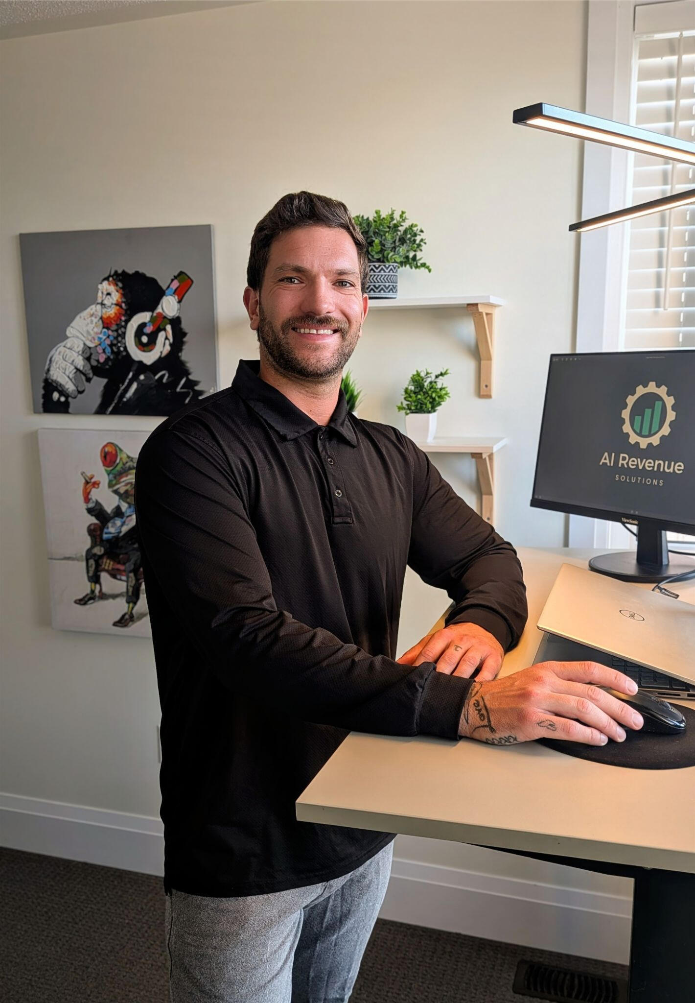 Joel Labranche – AI Revenue Solutions Operations Partner Joel Labranche standing at a modern desk with AI Revenue Solutions branding